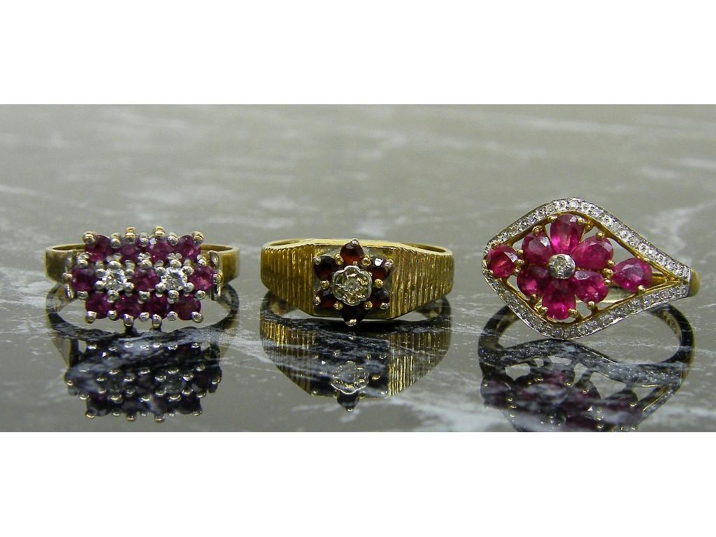 Appraisal: Three ct ruby cluster rings gm