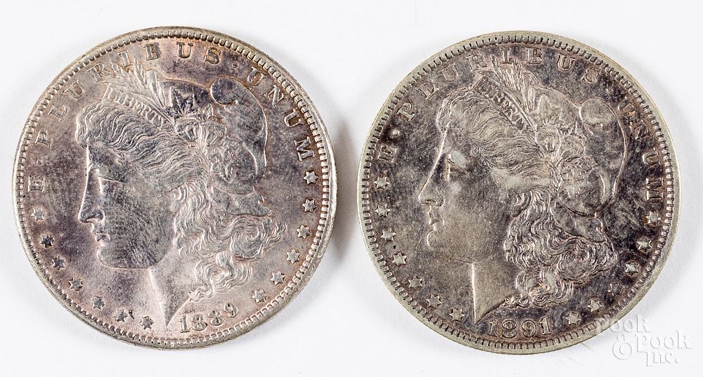 Appraisal: Two Morgan silver dollars and -O Two Morgan silver dollars