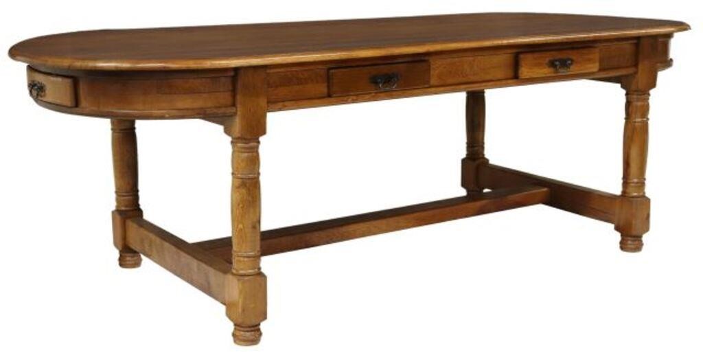 Appraisal: French Provincial oak farmhouse table th c oval tabletop over