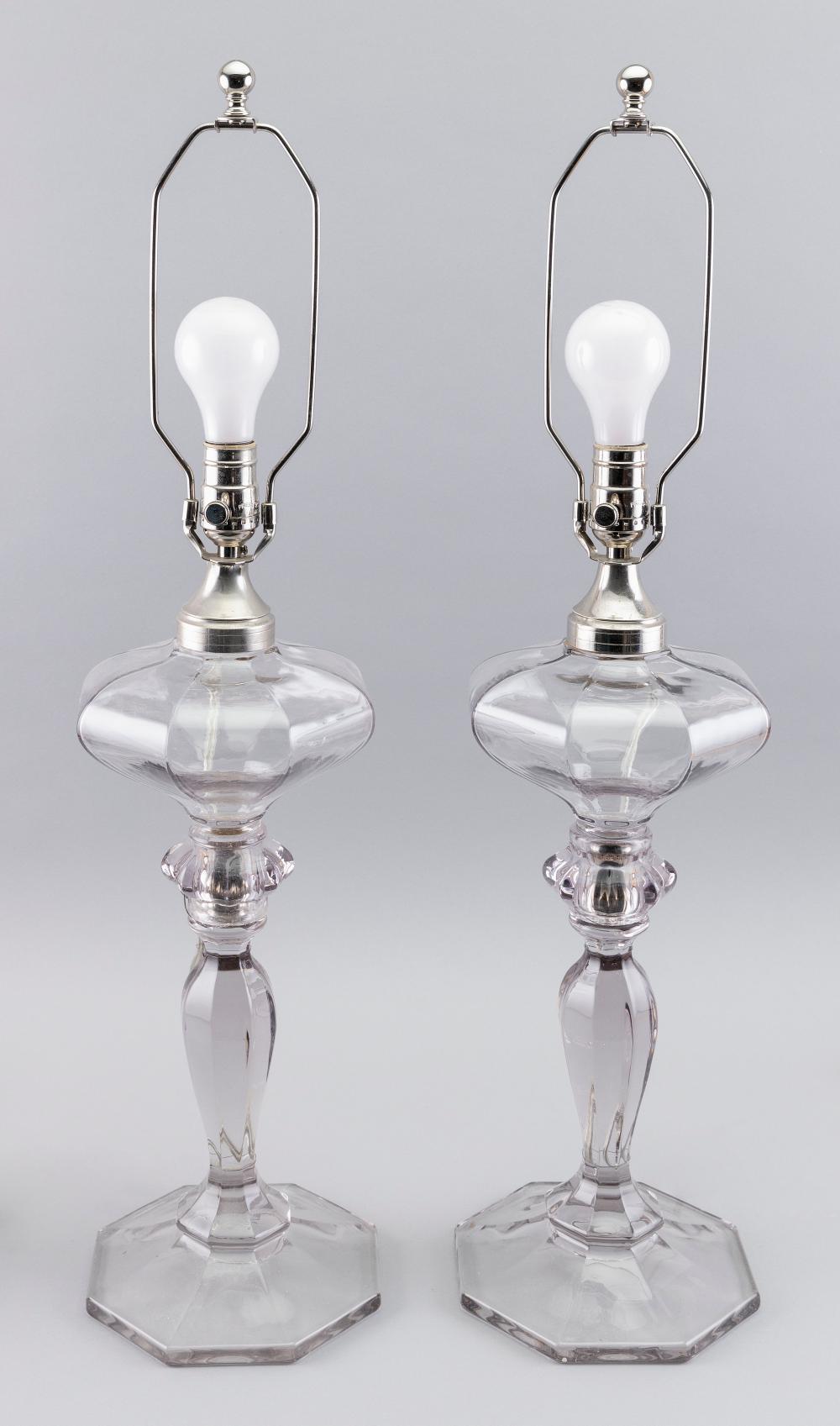 Appraisal: PAIR OF CLEAR GLASS BANQUET LAMPS FIRST HALF OF THE