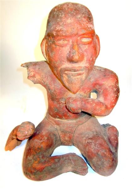 Appraisal: Meso American terracotta figure of an elderDepicting the elderly man