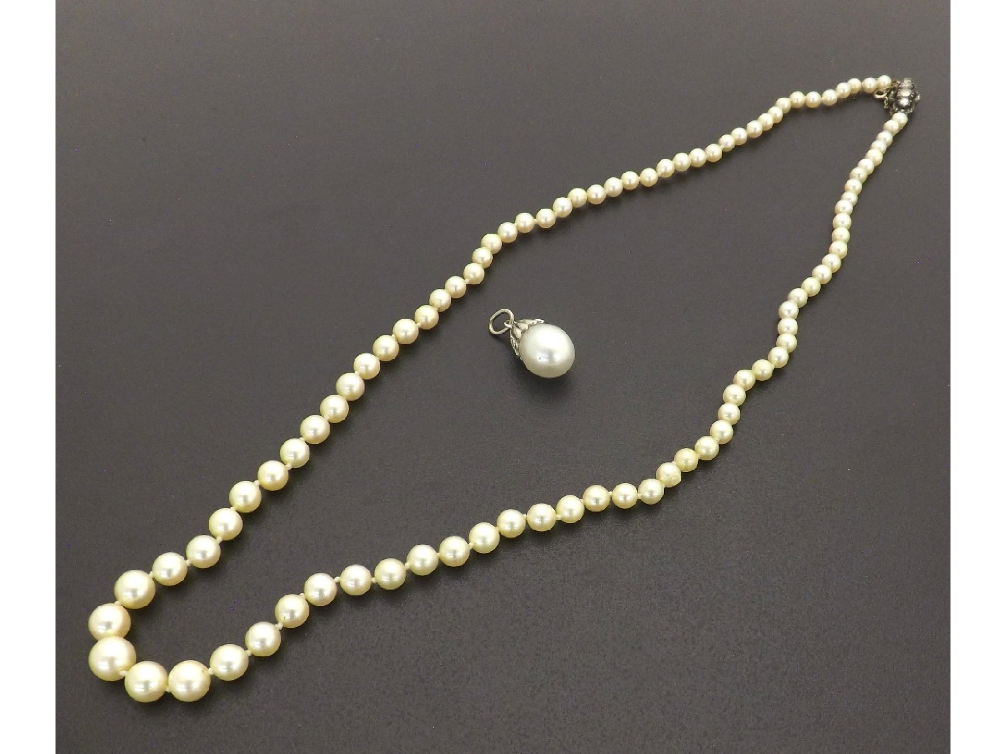 Appraisal: Cultured pearl graduated necklet with a rose-cut diamond clasp pearls