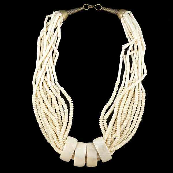 Appraisal: Tribal Ivory Necklace A multiple African ivory strand necklace composed