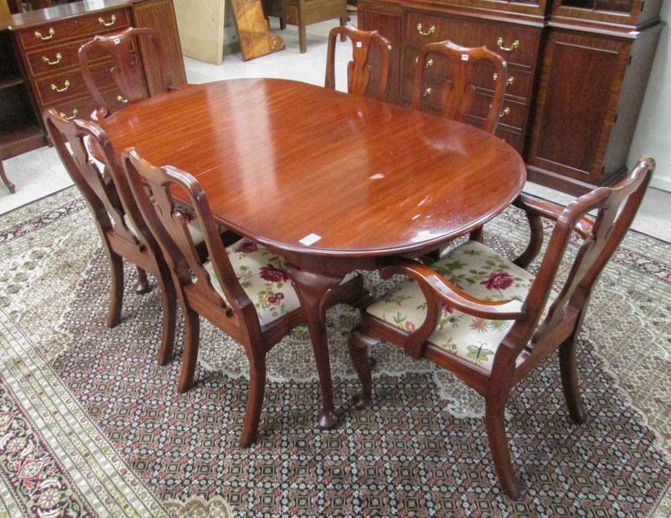 Appraisal: HENKEL-HARRIS DINING TABLE AND CHAIR SET WITH LEAVES Henkel-Harris Co