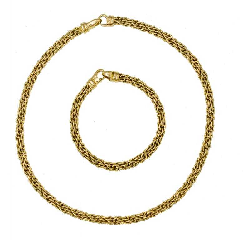 Appraisal: A GOLD ROPE NECKLACE AND A MATCHING BRACELET marked g