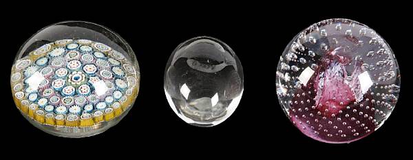 Appraisal: A group of glass paperweights height of largest in diameter