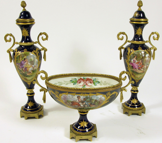 Appraisal: THREE PIECE 'SEVRES' BOWL AND URN SET The covered urns