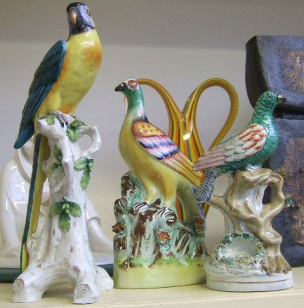 Appraisal: Two Staffordshire bird figures th century and a Naples porcelain