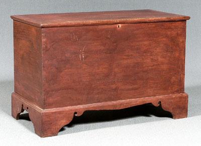 Appraisal: Red-painted pine lift top chest hinged lid open interior bracket