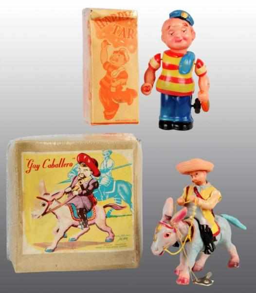 Appraisal: Lot of Celluloid Wind-Up Toys Description Made in Occupied Japan