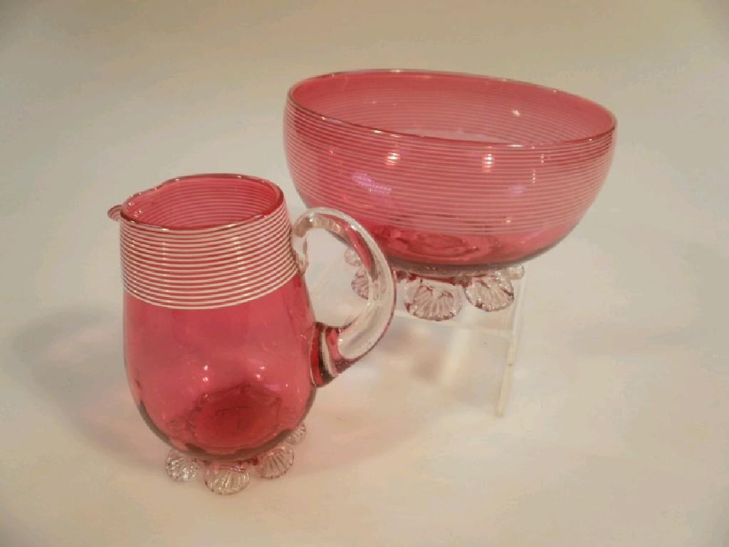 Appraisal: A Victorian cranberry tinted cream jug and sugar bowl each