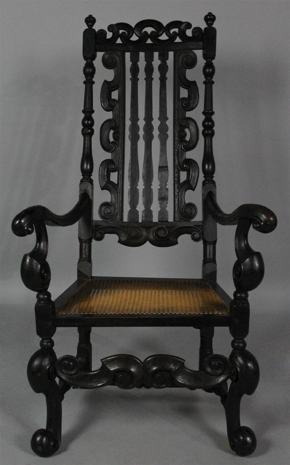 Appraisal: ENGLISH BAROQUE BEECHWOOD ARM CHAIR with arched rectangular scrolling baluster