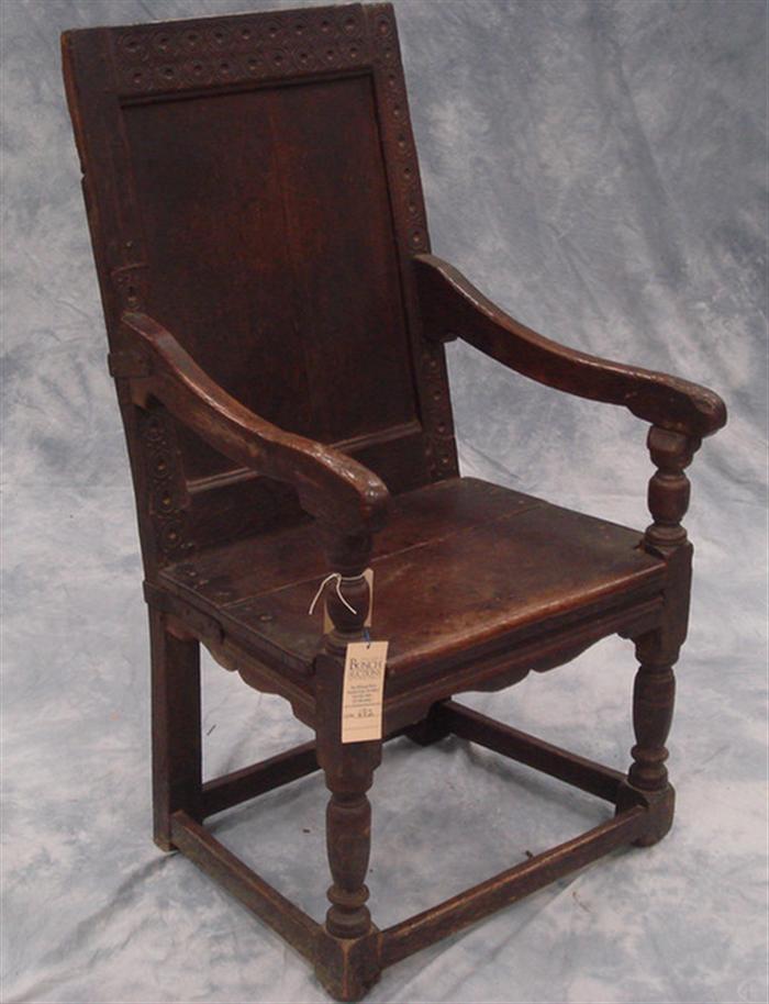 Appraisal: English oak wainscote chair Plain panel back Restoration to upper