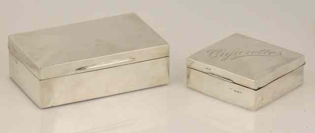 Appraisal: A silver cigarette box London of plain rectangular form cm