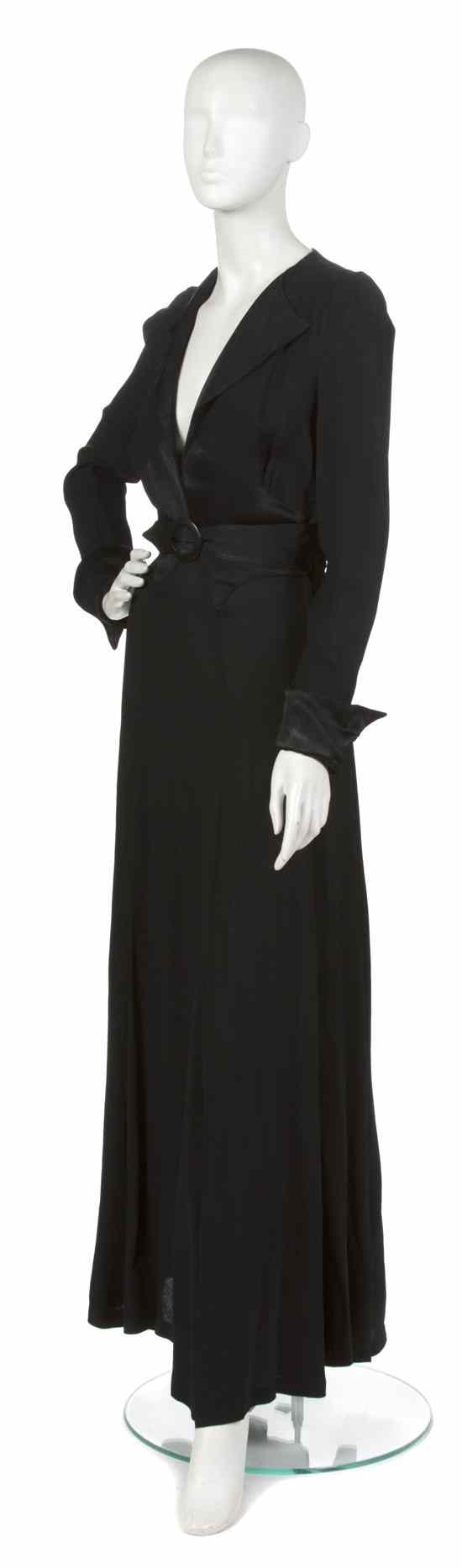 Appraisal: An Ossie Clark Black Moss Crepe Evening Gown plunging neckline