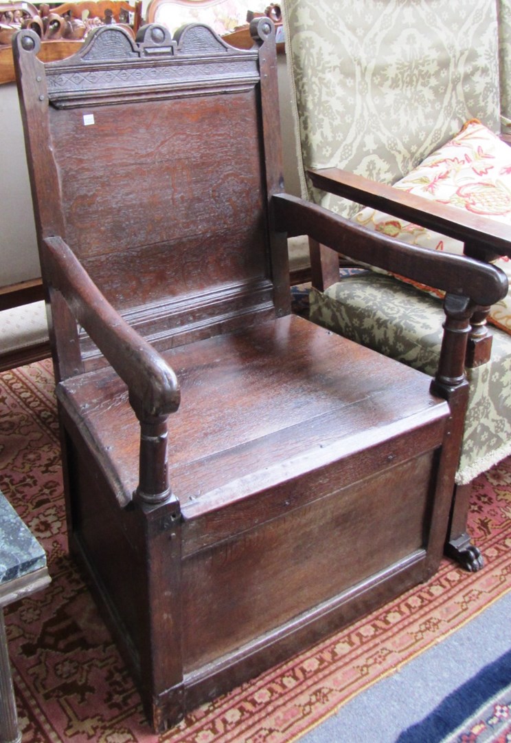 Appraisal: A th century and later oak panel back box seat