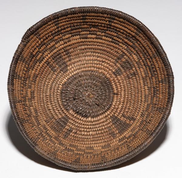 Appraisal: A WESTERN APACHE BASKETRY BOWL CIRCA The shallow bowl with