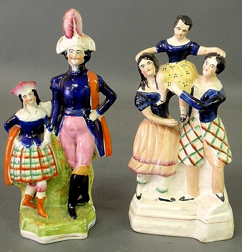 Appraisal: Two Staffordshire figural groups each approx h