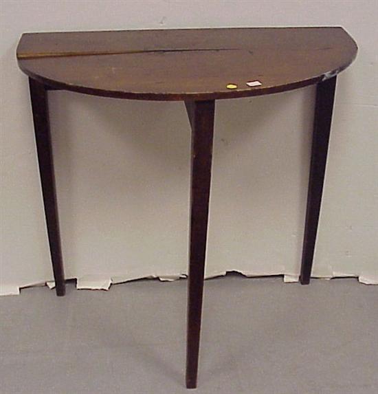 Appraisal: Demilune table with square tapered legs mahogany finish top split