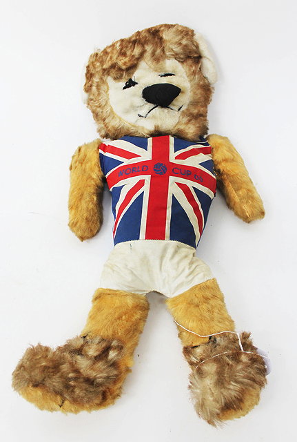 Appraisal: A WORLD CUP WILLY A GOLD PLUSH LION with Union