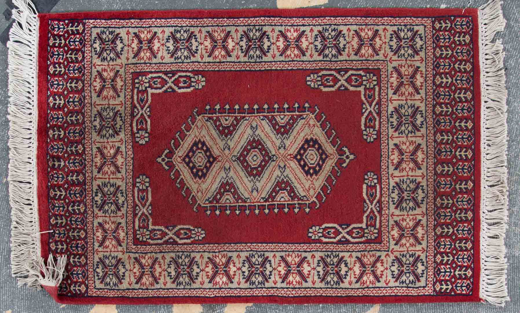 Appraisal: Bohkara scatter rug approx x Pakistan circa Condition Even wear