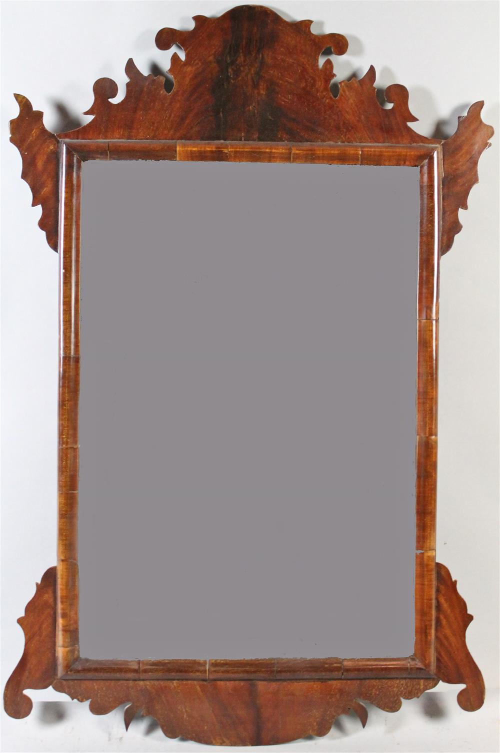 Appraisal: CHIPPENDALE STYLE MAHOGANY SCROLL CUT MIRROR late th C having