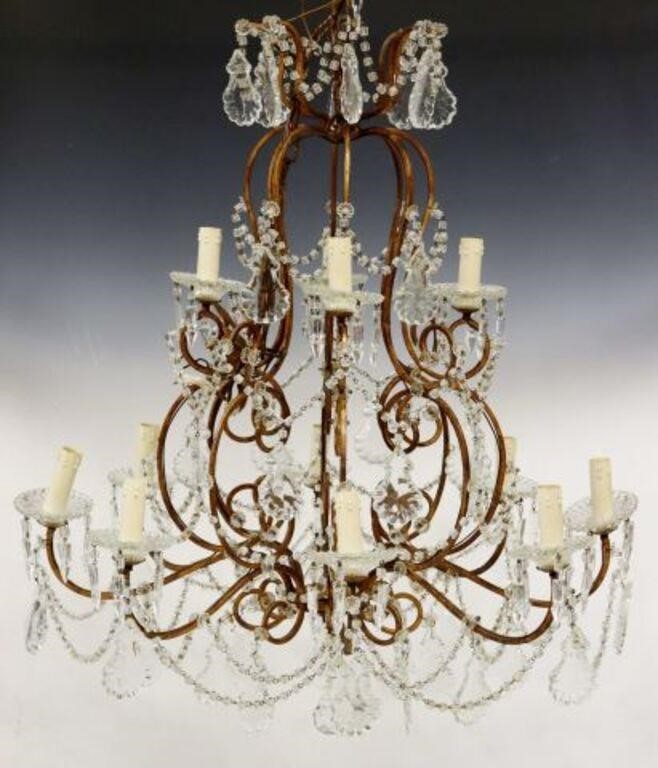 Appraisal: Italian gilt-metal and crystal twelve-light chandelier th c two-tier scrolling