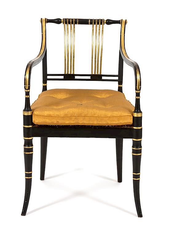 Appraisal: A Regency Ebonized and Gilt Decorated Open Armchair Height x