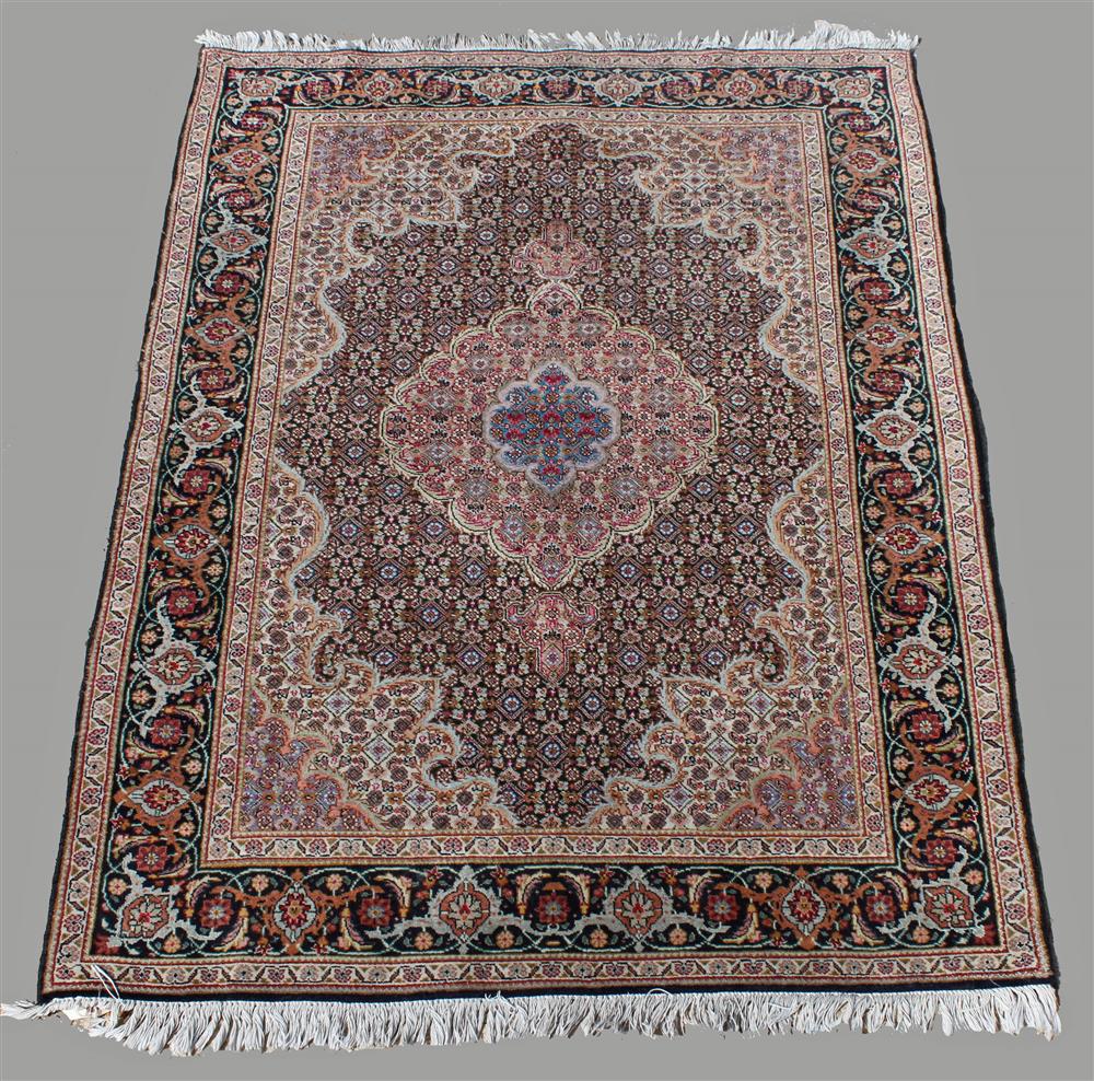 Appraisal: ORIENTAL MEDALLION WOOL RUG with central medallion drop pendants ornate