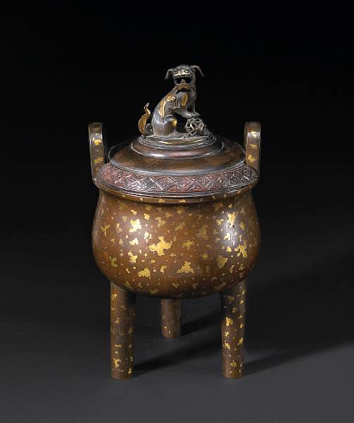 Appraisal: A good 'sun spot' bronze tripod censer with wood cover