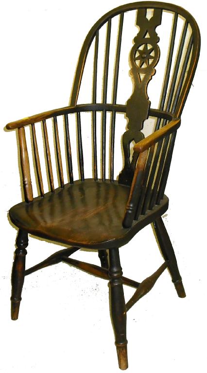 Appraisal: Wheelback Windsor armchair with a hooped back over a spindle