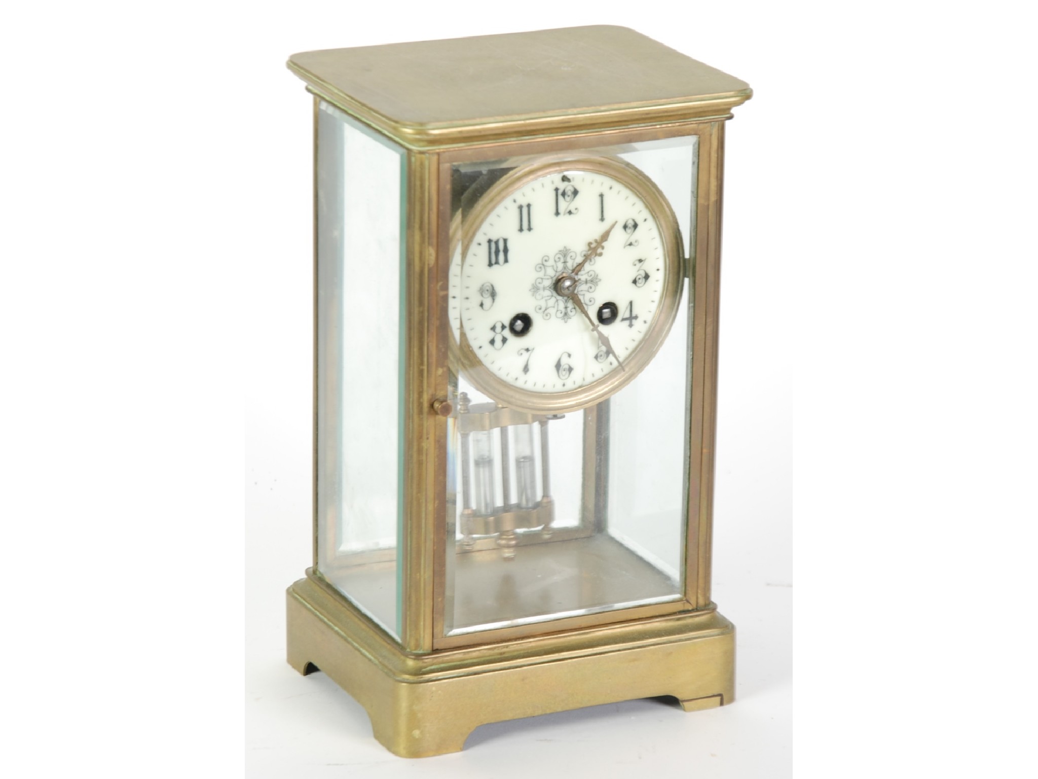 Appraisal: AN EDWARDIAN FOUR GLASS BRASS MANTLE CLOCK eight day movement