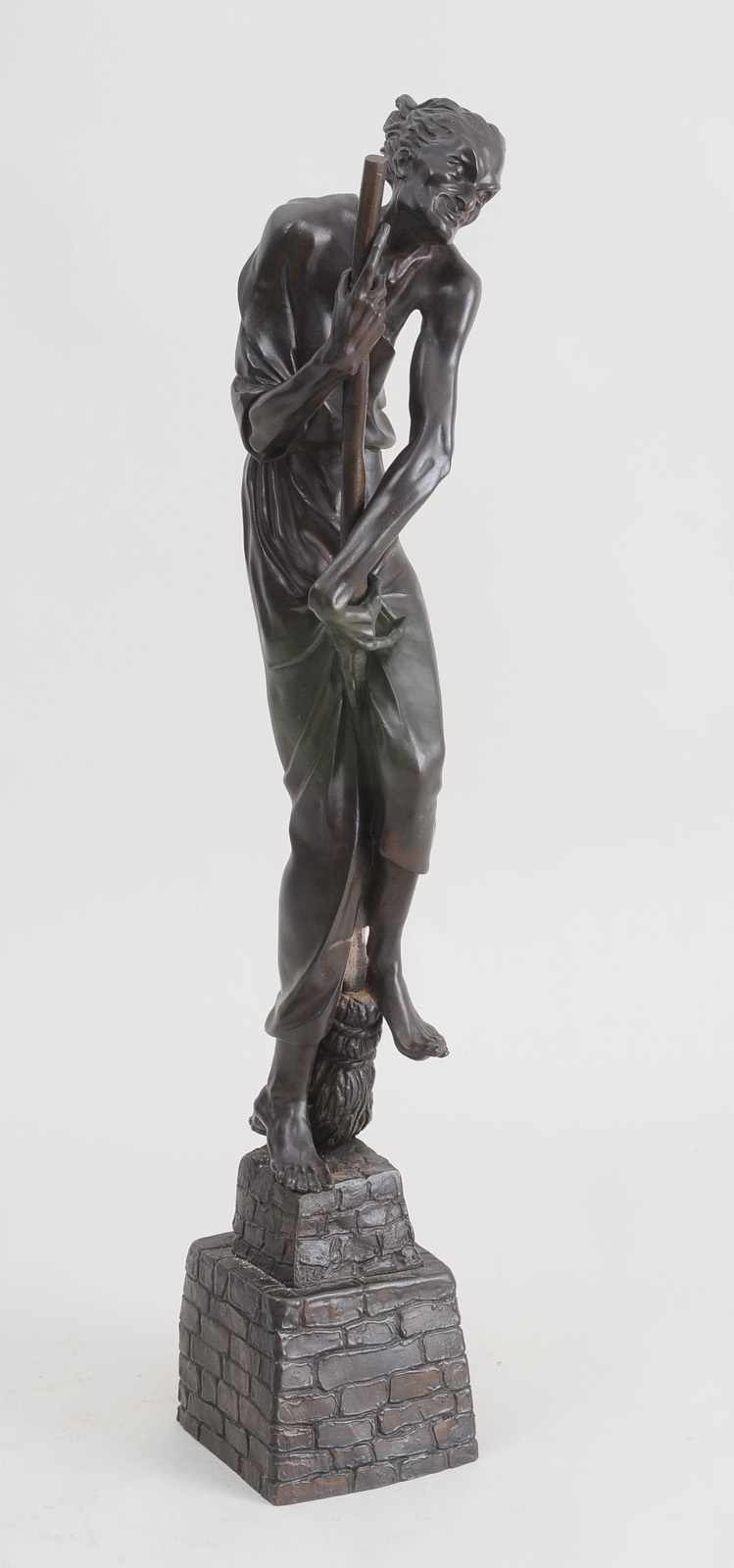 Appraisal: MAN WITH BROOM Bronze modeled as a barefoot man holding