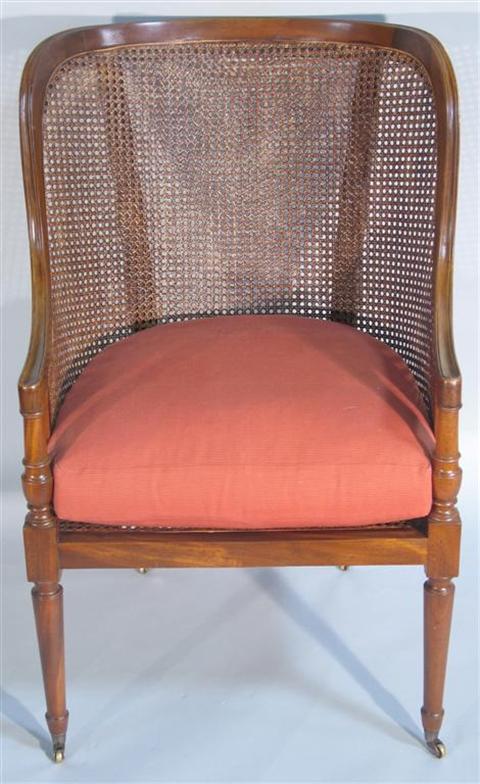 Appraisal: REGENCY STYLE CANE AND MAHOGANY TUB CHAIR th century the