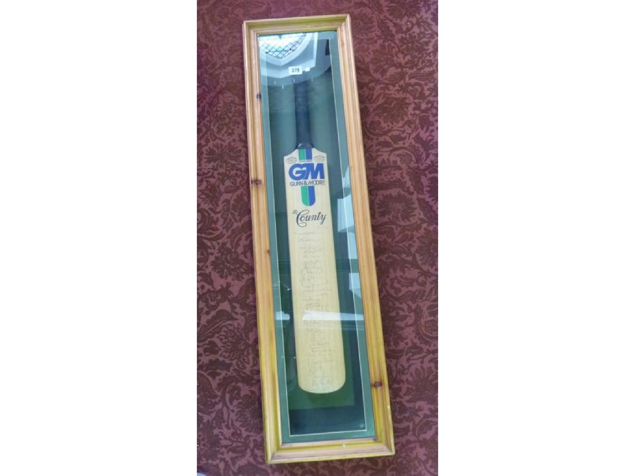 Appraisal: A Gunn Moore cricket bat signed by players from Gloucester