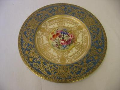 Appraisal: A ROYAL WORCESTER PORCELAIN PLATE the centre painted by E