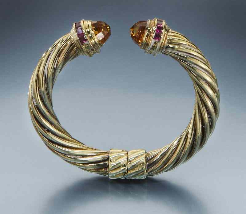 Appraisal: David Yurman K gold hinge bracelet setwith faceted topaz terminals