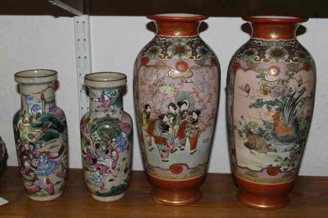 Appraisal: A PAIR OF KUTANI PORCELAIN VASES having panels of Geisha