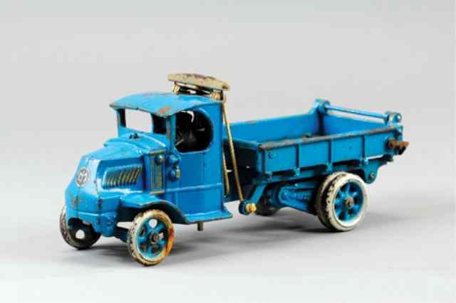 Appraisal: ARCADE T-BAR MACK DUMP TRUCK Cast iron painted in blue