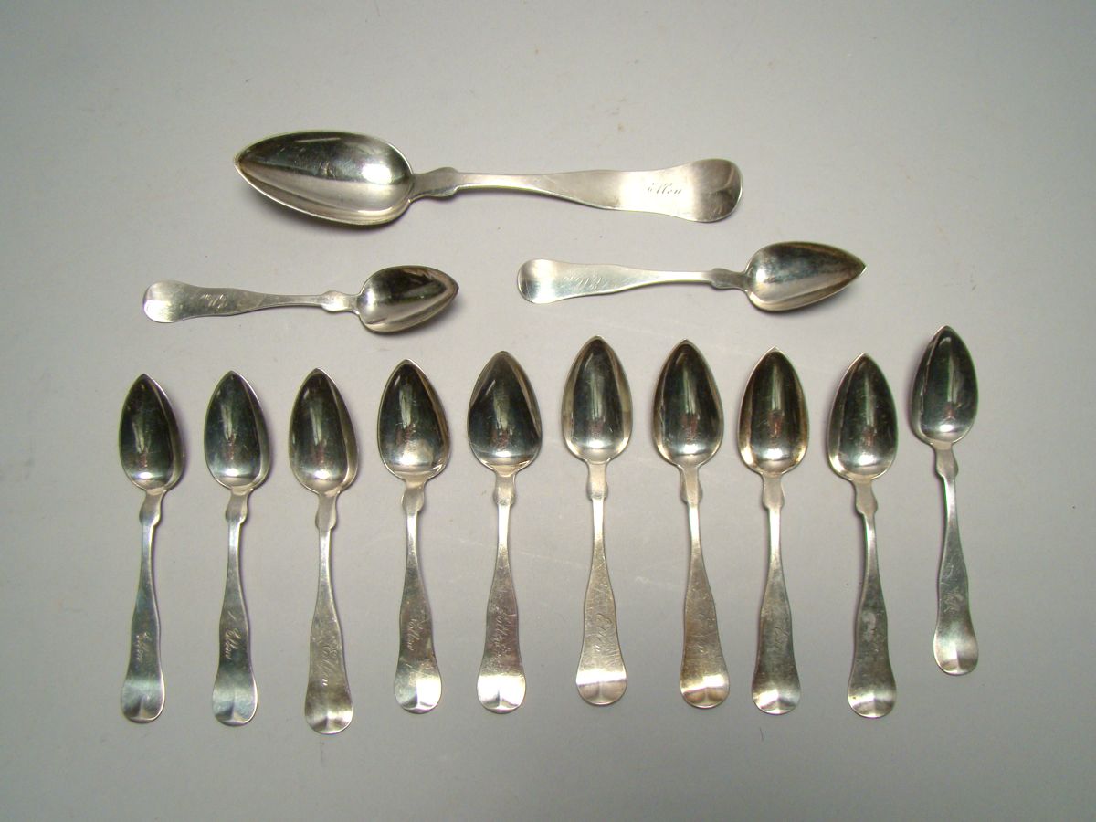 Appraisal: THIRTEEN AMERICAN SILVER FIDDLEBACK SPOONS Makers include Farrington Hunnewell L