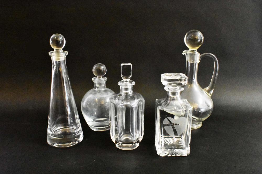 Appraisal: FIVE VARIOUS COLORLESS GLASS DECANTERS th Century All with stoppers