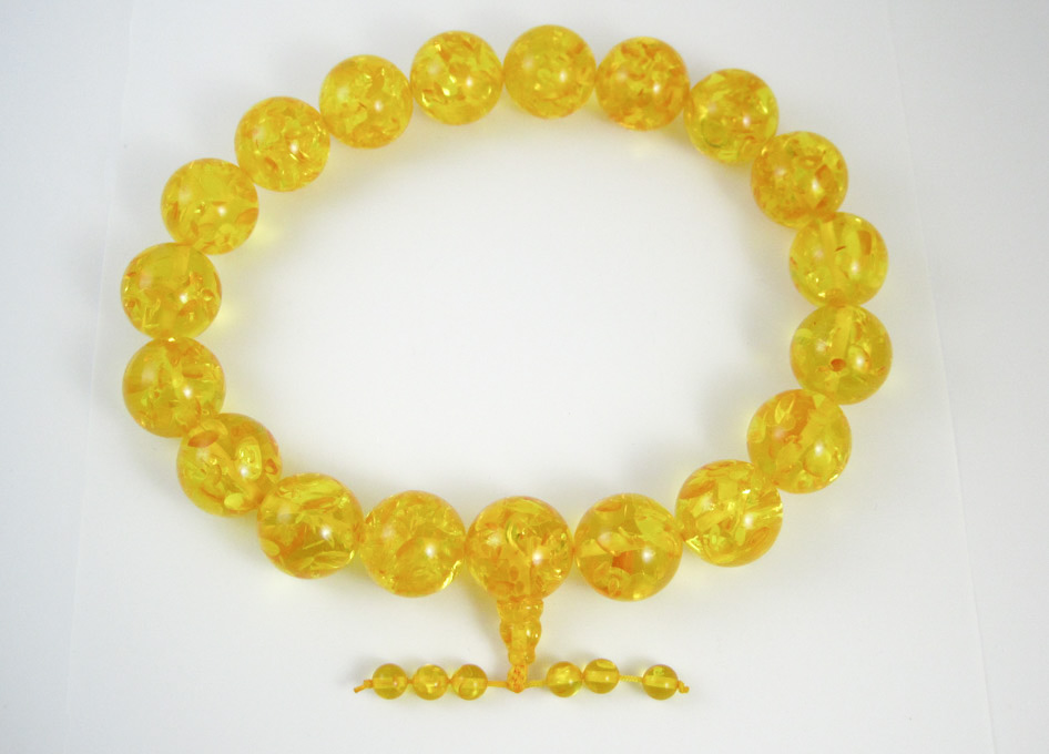 Appraisal: BALTIC PRESSED AMBER BEAD NECKLACE measuring approximately inches in length