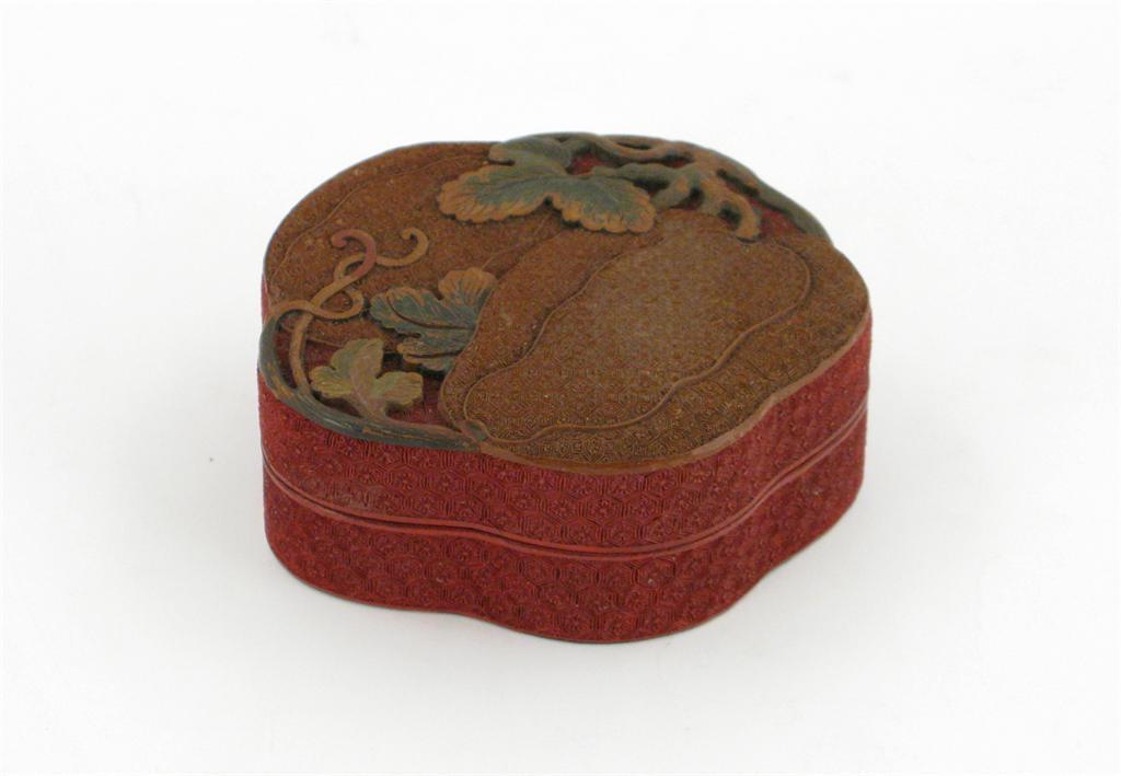 Appraisal: An unusual Chinese red cinnabar lacquer box and cover