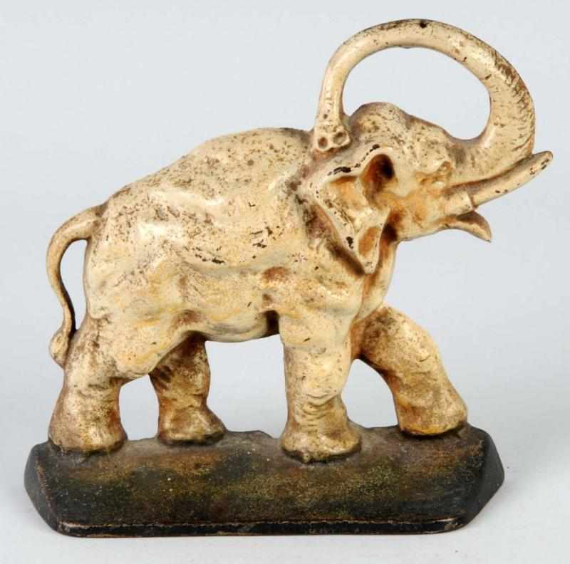 Appraisal: Cast Iron Elephant Doorstop Description Made by Creations Company Condition