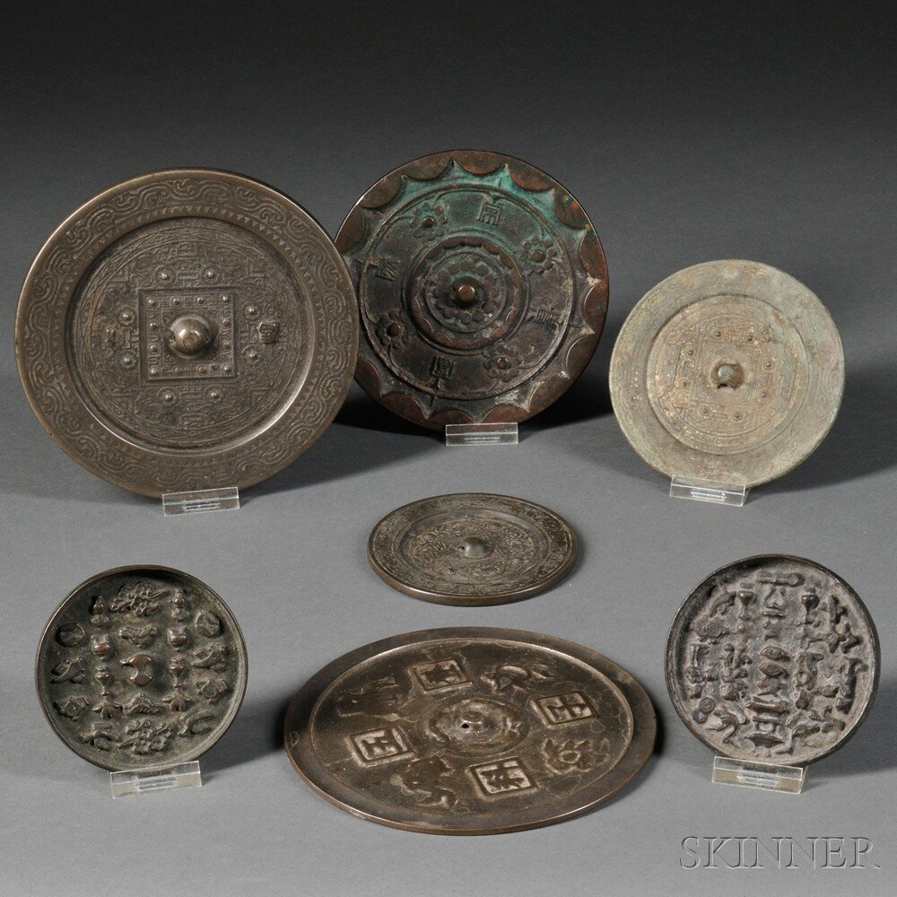 Appraisal: Seven Round Bronze Mirrors China two dish-shaped decorated with auspicious