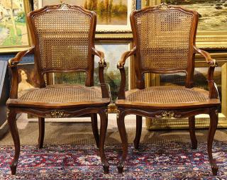 Appraisal: Pair of Louis XV style partial gilt fauteuils Pair of