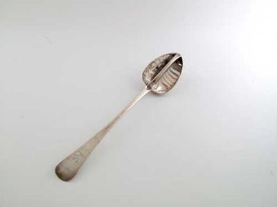 Appraisal: A George IV Irish strainer spoon old English pattern with