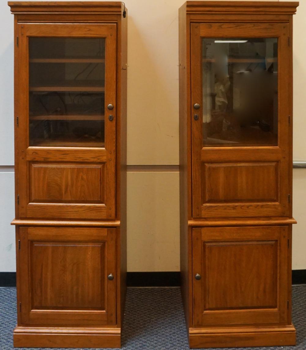 Appraisal: PAIR OF HOOKER OAK FINISH ILLUMINATED NARROW SIDE CABINETS X