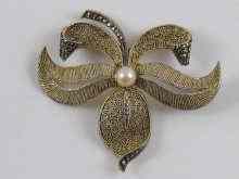 Appraisal: A silver gilt and marcasite floral brooch set with a