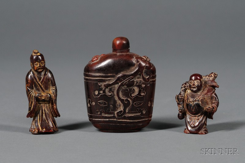 Appraisal: Three Asian Horn Carvings two standing figures and a bottle